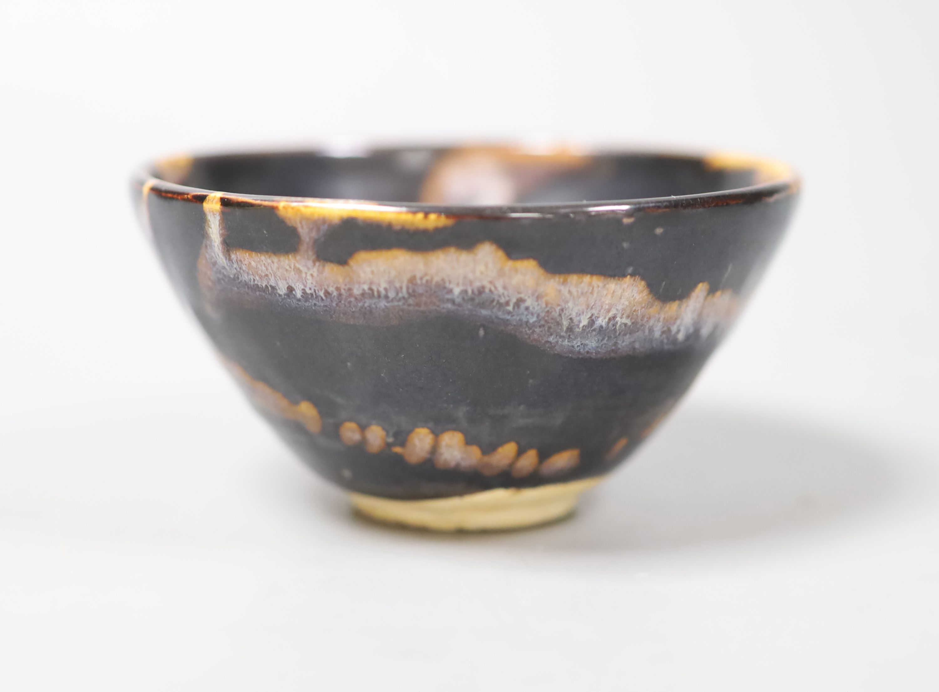 A Chinese blackware splashed bowl 11cm diam